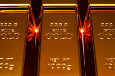 Altın sarısı arka plan. Altın arka plan. Çubuklarda altın. İyi altın kavramı