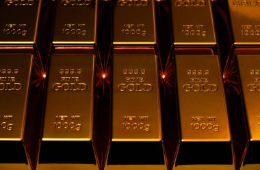 Altın külçe lüks yatırım yığını. Altın külçeleri ile piyasa değeri. Altın değerli metal rezerv değeri. Altın güvenli zenginlik güvenlik kavramı