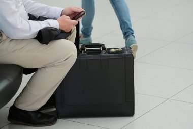 Male figure with baggage