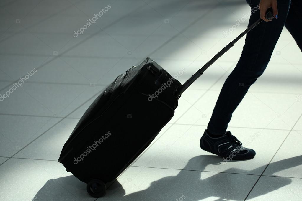 Legs moving with rolling suitcase