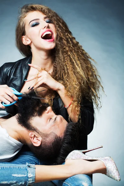 Woman cutting beard — Stock Photo, Image