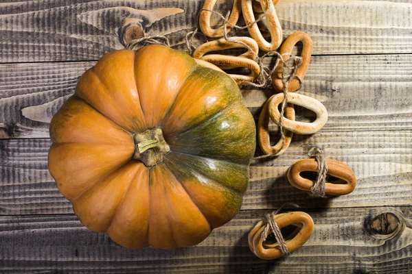 Pumpkin with bunches of cracknels — Stok fotoğraf