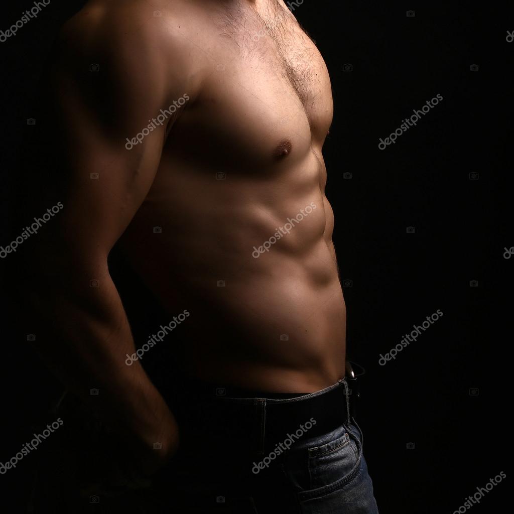 Muscular male torso — Stock Photo © Tverdohlib.com #89199424