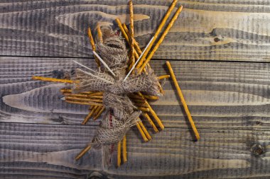 Voodoo doll over straws