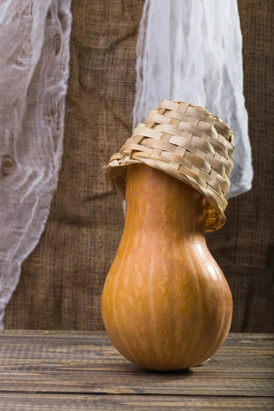 Gourd with wicker basket — Stok fotoğraf