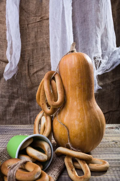 Gourd with bunches of cracknels — Stock Photo, Image
