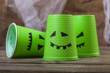 Disposable cups with ghost smiles