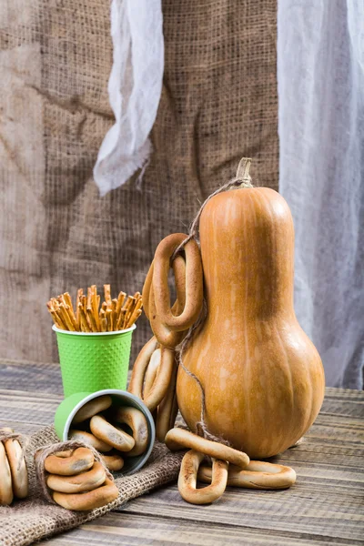 Gourd with cracknels and straws — Stock Photo, Image
