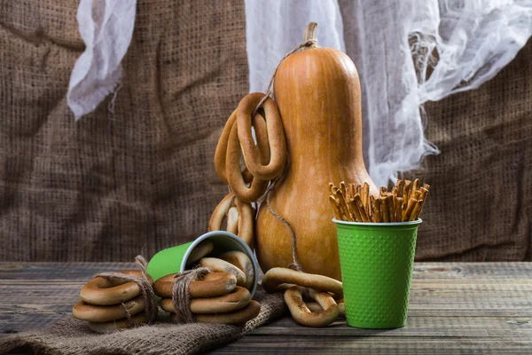 Gourd with cracknels and straws — Stock Photo, Image