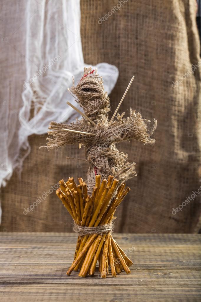 wooden voodoo doll