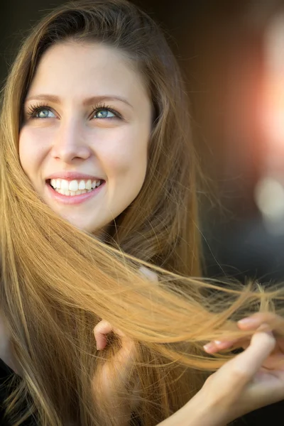 Smiling young blonde girl — Stock Photo, Image