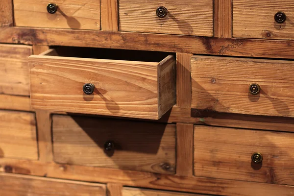 Wooden sideboard with small drawers — 图库照片