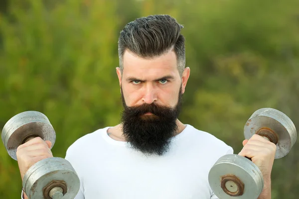 Man with dumbells — Stock Photo, Image