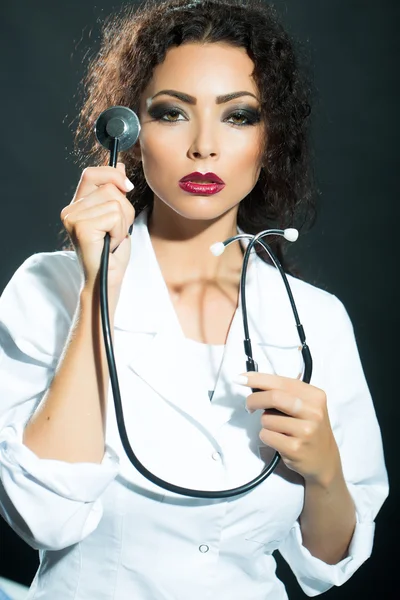 Woman with stethoscope — Stock Photo, Image