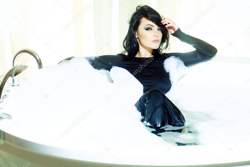 Wet woman in bath