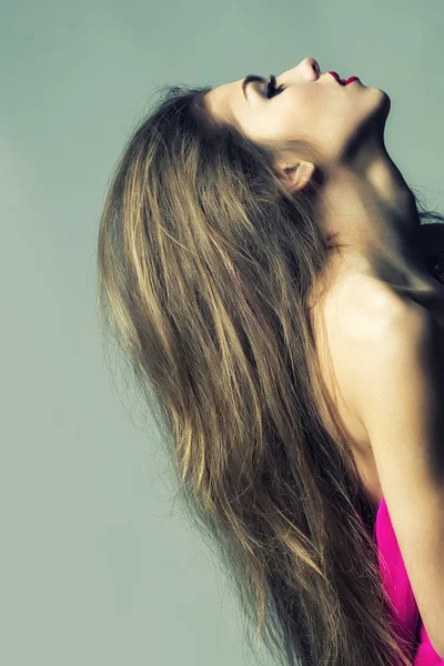 Woman with lush long hair — Stock Photo, Image