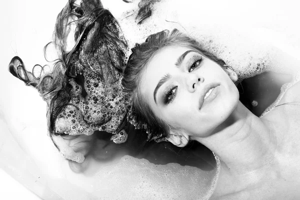 Flirtatious woman in bath — Stock Photo, Image