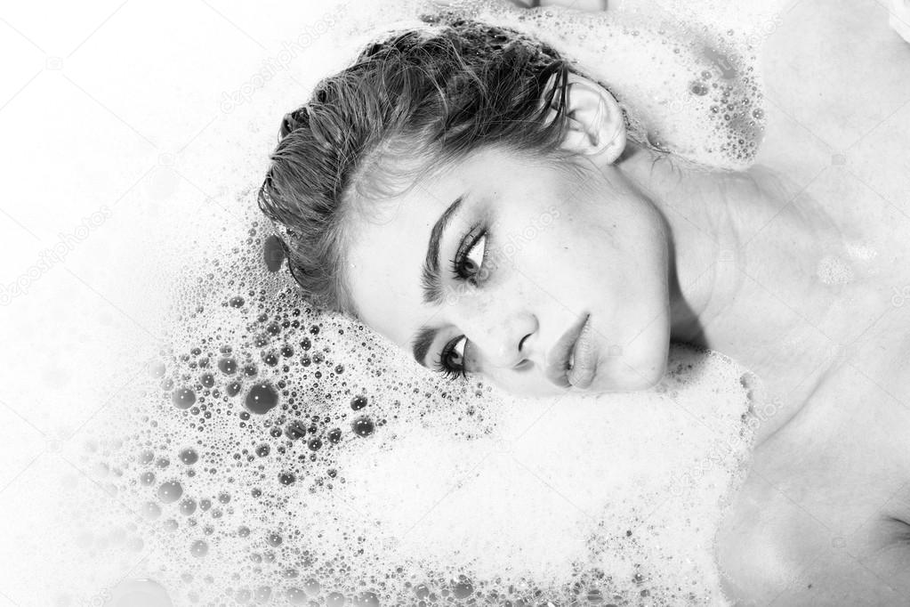 Flirtatious woman in bath