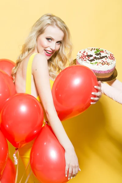 Happy woman with cake — Stock Photo, Image