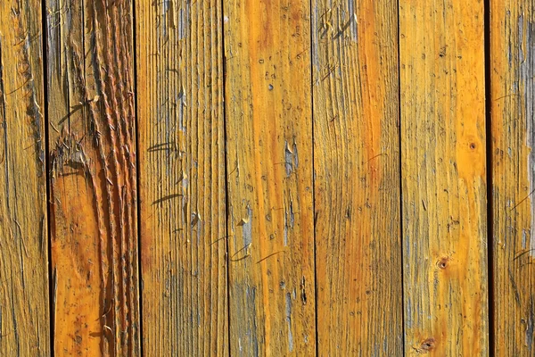 Close boarded fence loosing paint — Stock Photo, Image