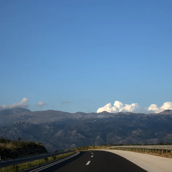 Modern asphalt highway in mountains — Stock Photo, Image