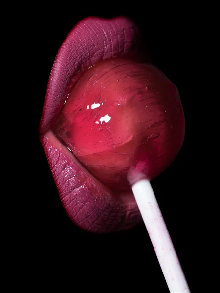 Vrouwelijke lippen en lolly — Stockfoto