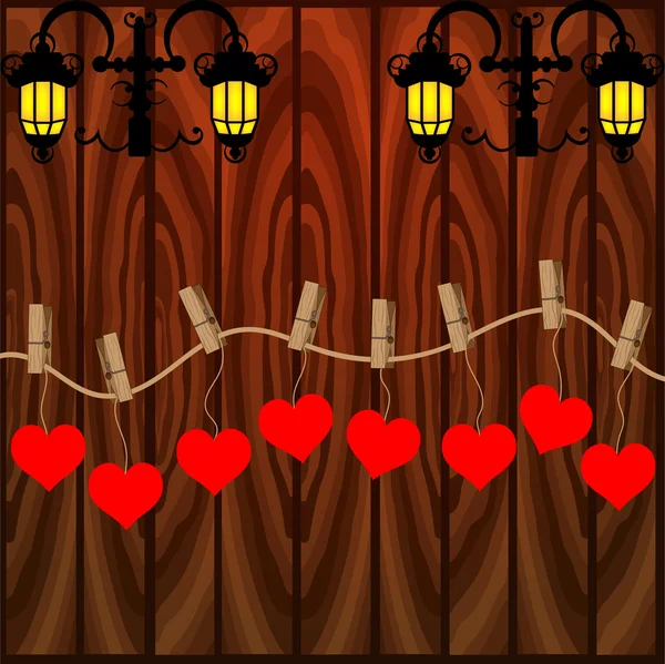 Hearts and lamp on wood — Stok Vektör