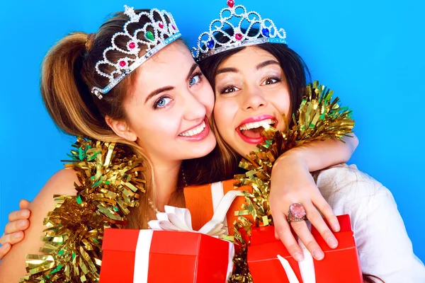 Girls holding bright gifts and presents — Stockfoto