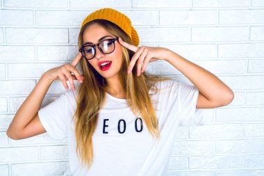 portrait of young hipster blonde woman