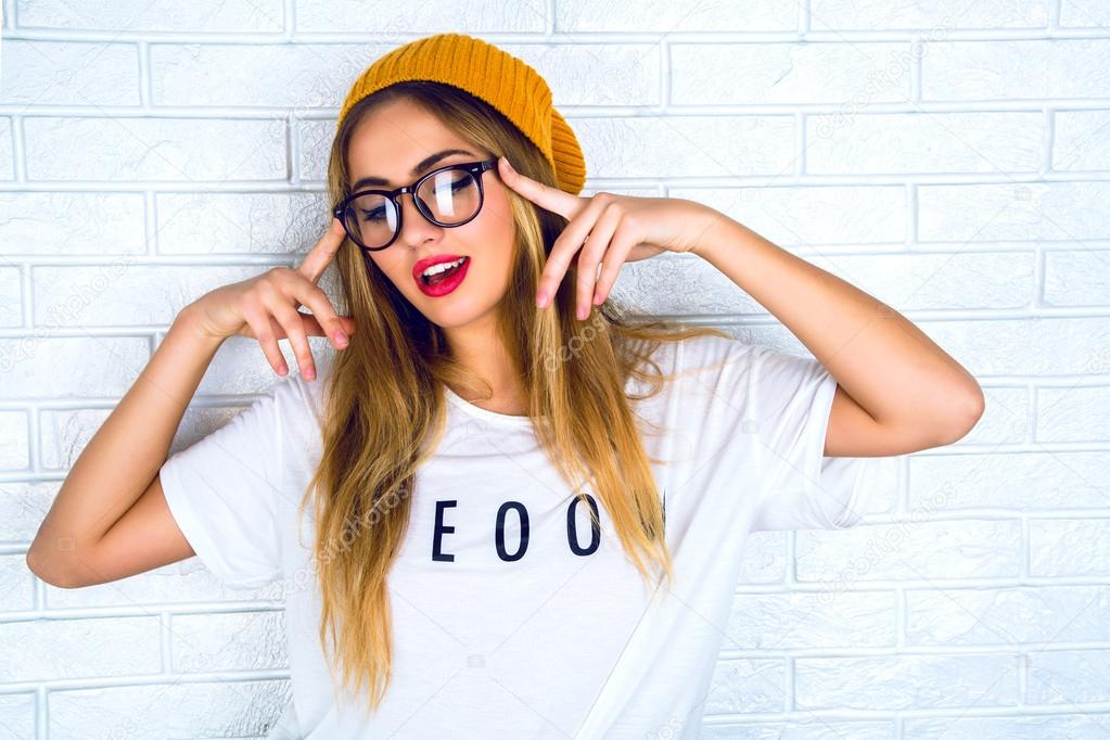 portrait of young hipster blonde woman