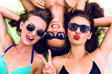 Close up summer portrait of thee girls