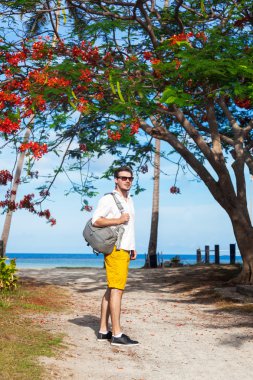 man traveling alone with back pack