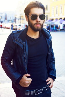 Young handsome stylish biker man