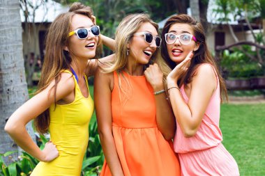 outdoor portrait of three young women