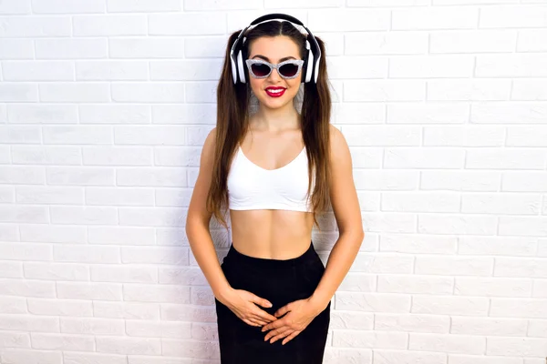 Cute girl listen to music on headphones — Stok fotoğraf