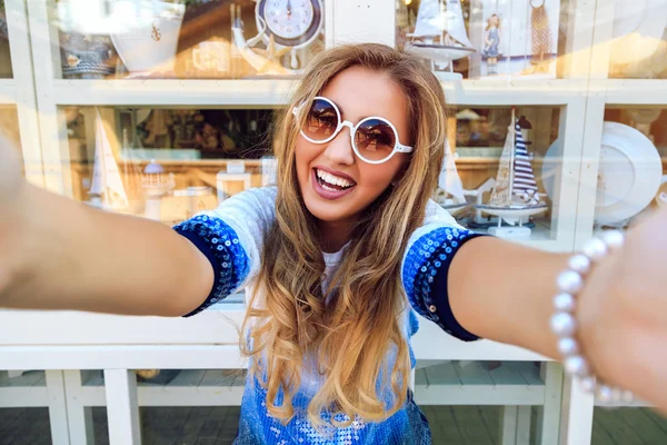 Girl trying to take your camera — Stock Photo, Image