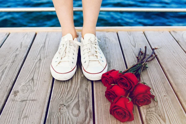 Woman posing in white sneakers shoes — Stock Photo, Image