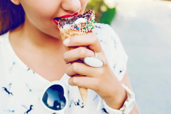 Close up image of woman eating ice-cream — Stock Fotó