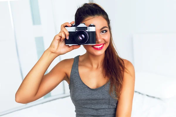 Smiling photographer girl making picture — Stock Photo, Image