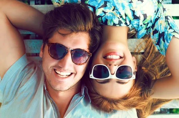 Portrait of young perfect couple lying — Stock Photo, Image