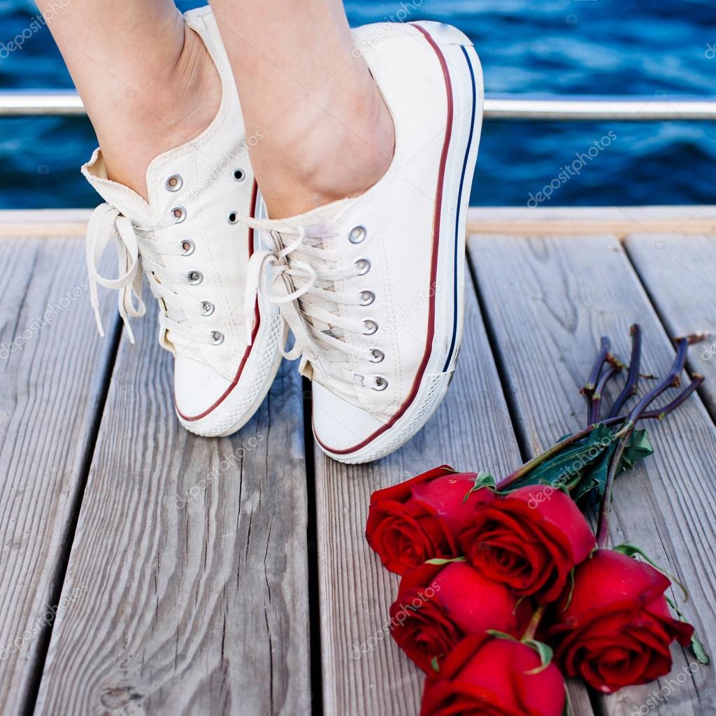 woman in sneakers shoes