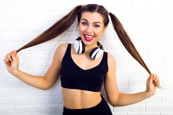 Girl with two ponytails having fun — Stock Photo, Image