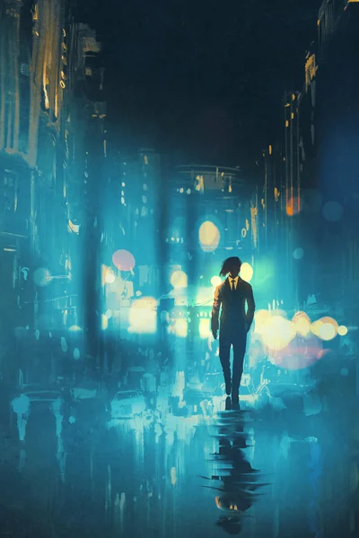 Чоловік ходить вночі на мокрій вулиці — стокове фото