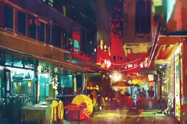 Bâtiment coloré et rue de la ville la nuit, paysage urbain — Photo