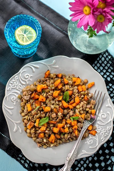 Warm lentil salad with pumpkin and mint — Stock Photo, Image