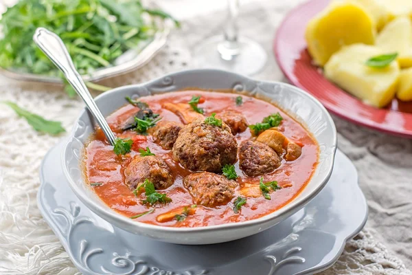 Meatballs albondigas in tomato sauce with mushrooms — Stock Photo, Image