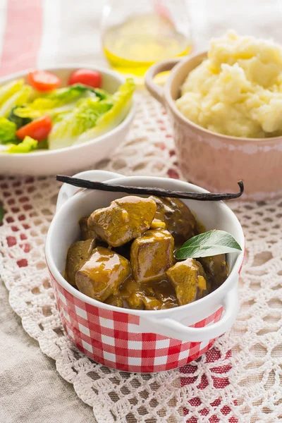 Duck filet in gravy with vanilla served with mashed potatoes — Stock Photo, Image