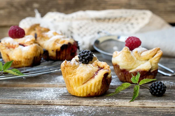 Raspberry and blackberry pies with chocolate
