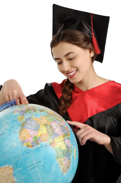 Hermosa estudiante de posgrado en el manto con globo — Foto de Stock