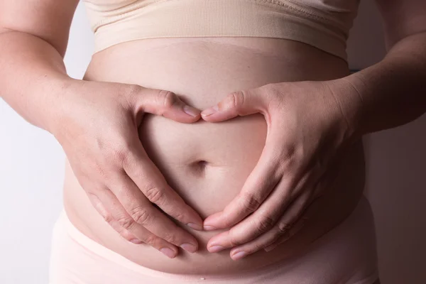 Belly of pregnant woman — Stock Photo, Image